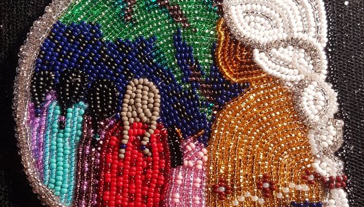 A photo of a beaded art piece.