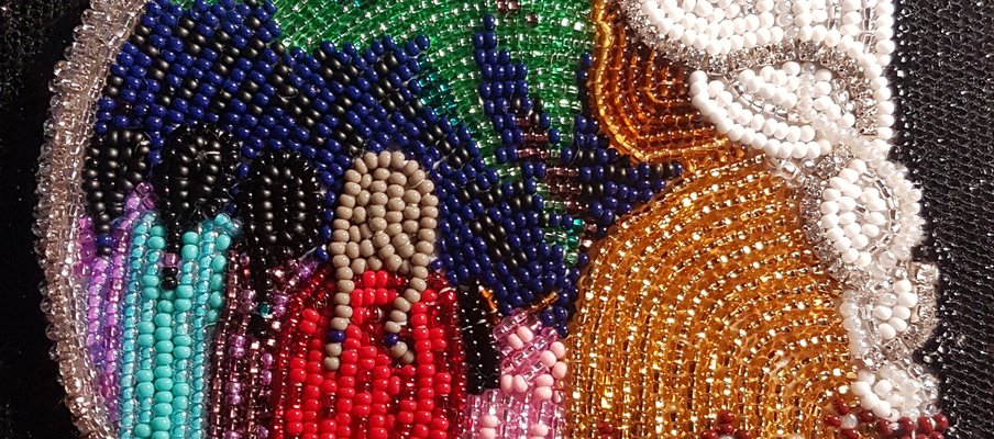 A photo of a beaded art piece.