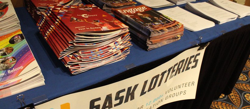 A photo of a table with copies of Engage Magazine and the Annual Report at the 2024 AGM.