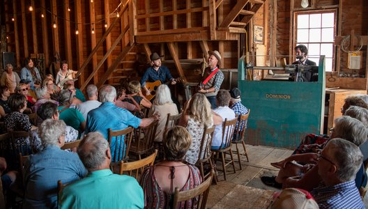 an audience watches Jeffrey Straker