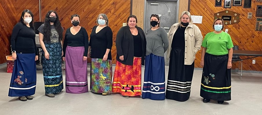 Participants model the diversity of their completed ribbon skirts. Photo by Tracy Tinker